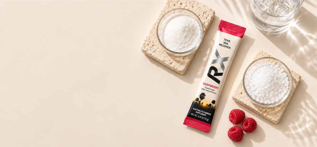 RYVEX Raspberry electrolyte stick with raspberries and a glass of water
